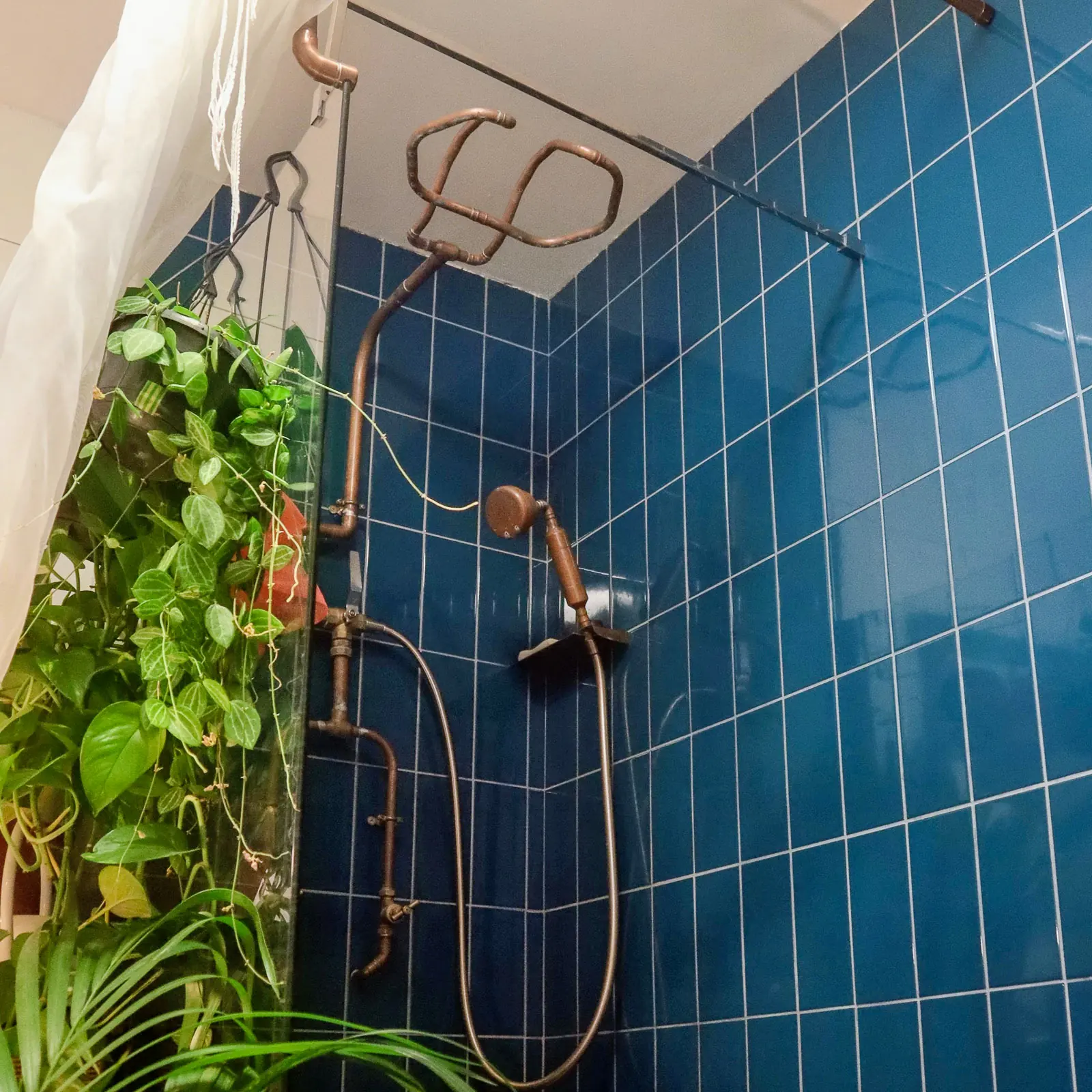 Bespoke bathroom with custom copper pipework and shower, Paddock Close